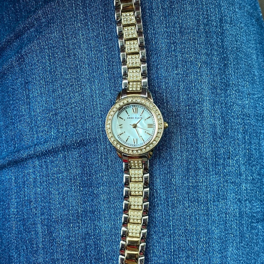 It’s a Anne Klein stainless steel back watch
